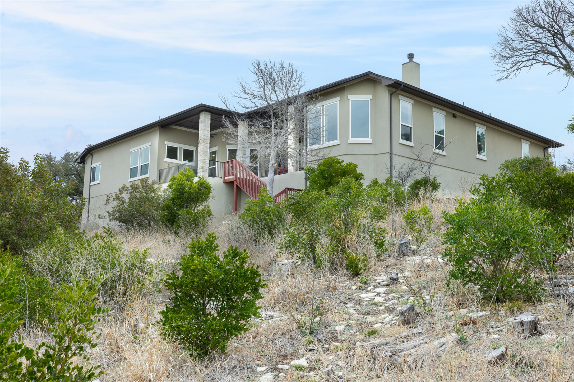 235 Chestnut Crossing Burnet, TX 78611 - Photo 31 of 39 a front view of a house with garden