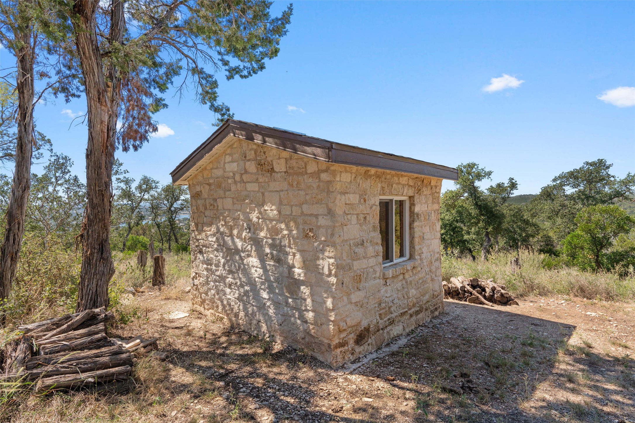 235 Chestnut Crossing Burnet, TX 78611 - Photo 33 of 39 a backyard of a house with lots of green space