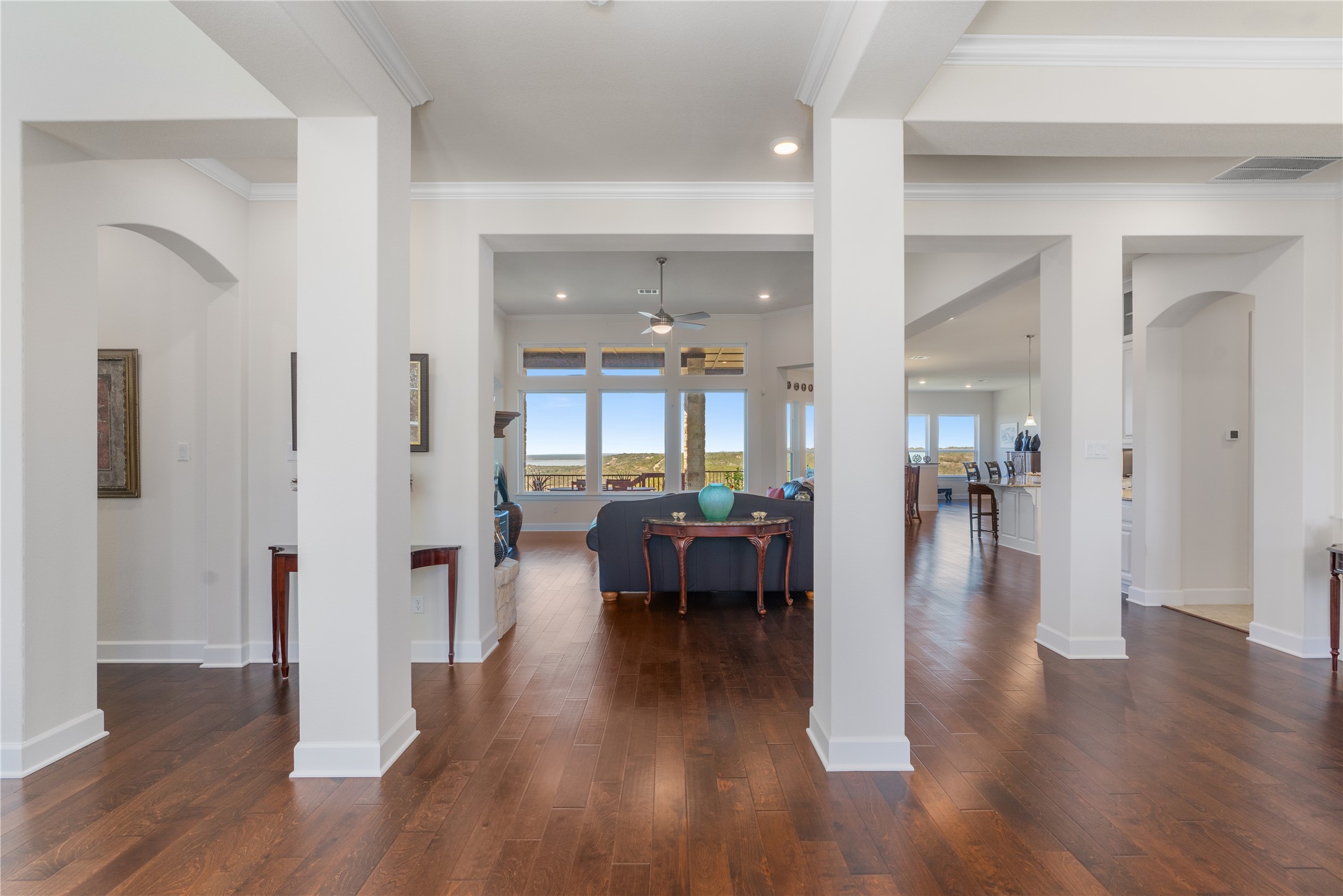 235 Chestnut Crossing Burnet, TX 78611 - Photo 5 of 39 a living room with furniture and a wooden floor