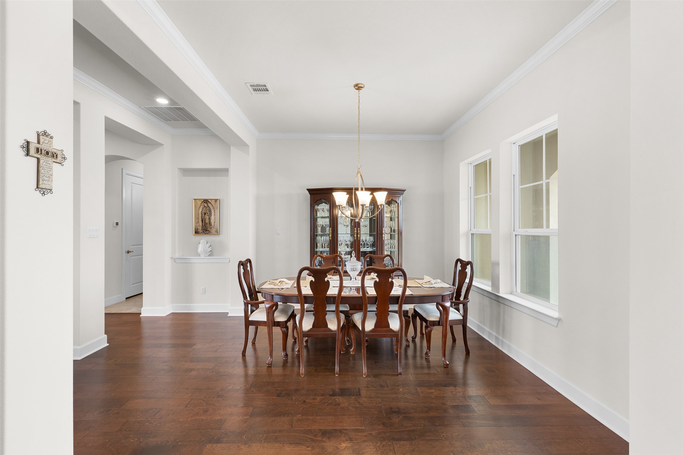235 Chestnut Crossing Burnet, TX 78611 - Photo 7 of 39 a view of a dining room with furniture window and wooden floor
