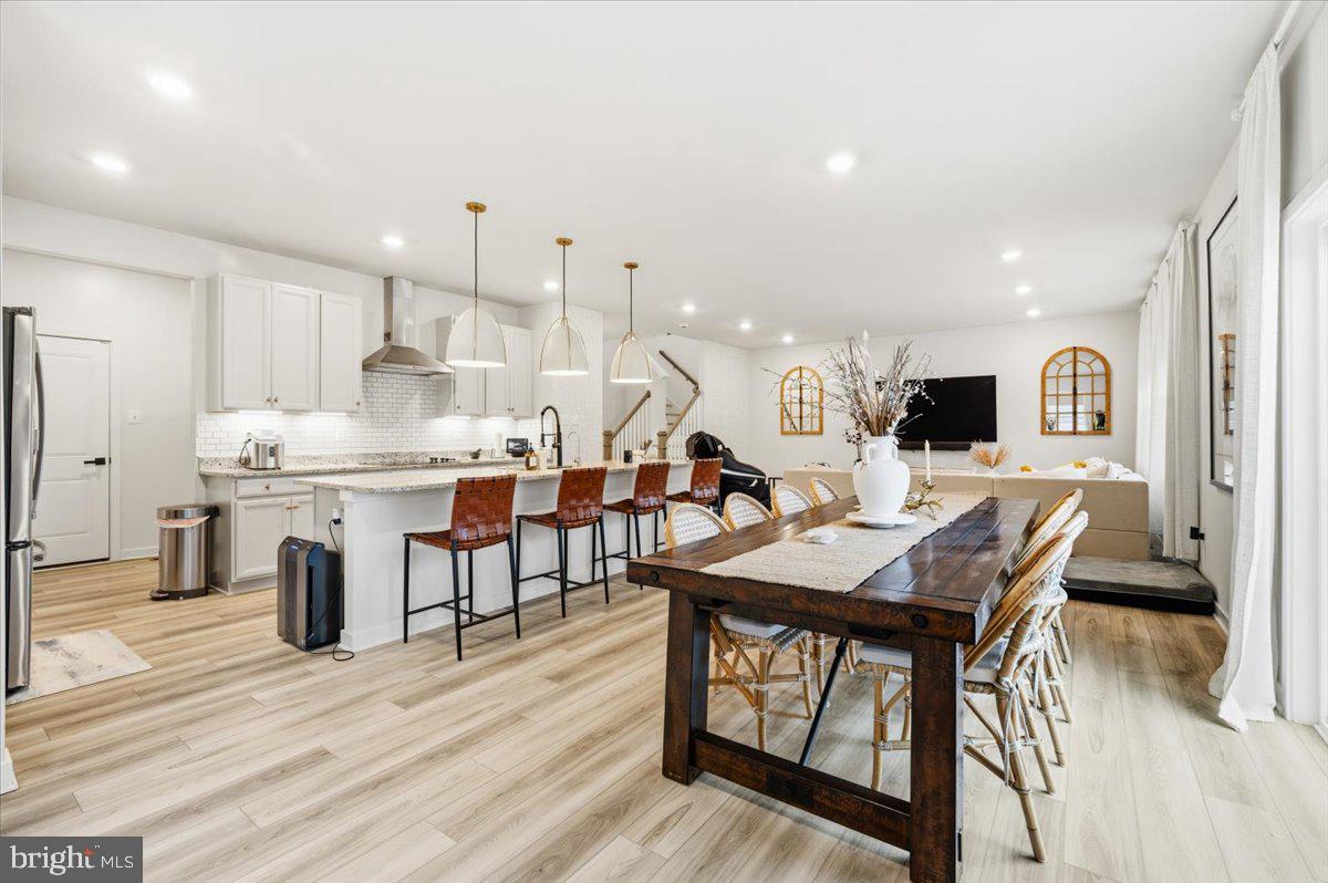 241 Short Branch Drive Ranson, WV 25438 - Photo 12 of 54 Modern open-concept kitchen dining area.