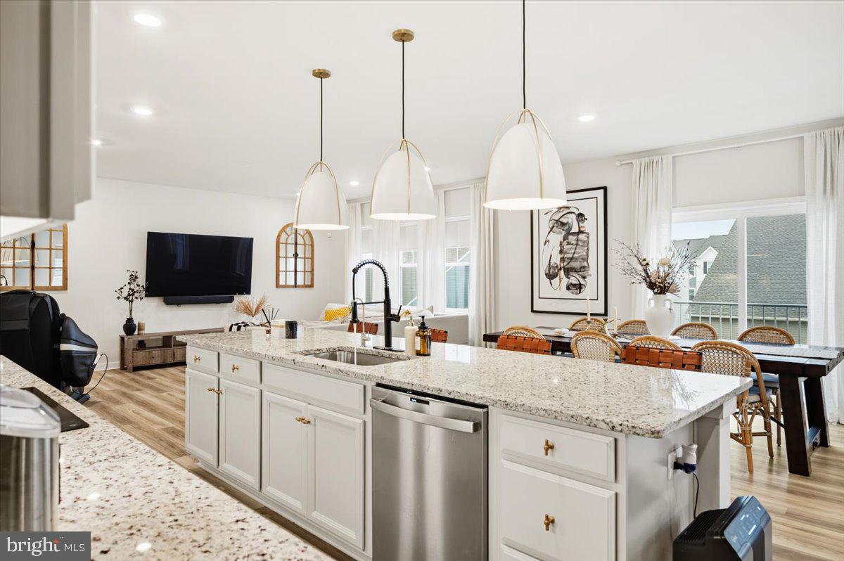 241 Short Branch Drive Ranson, WV 25438 - Photo 15 of 54 Modern kitchen with elegant lighting.