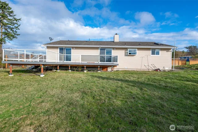 a view of a garden with a lake view