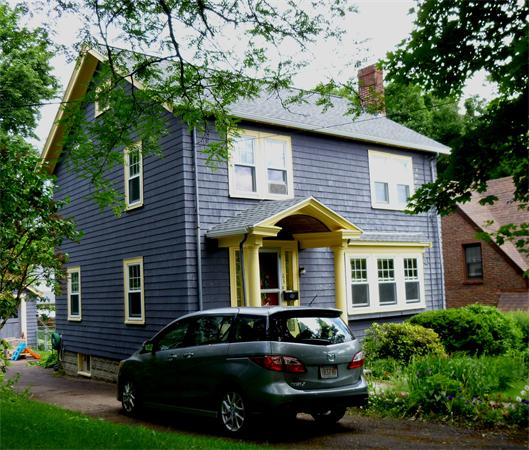 63 Robbins Road Arlington, MA 02476 - Photo 1 of 2 a front view of a house with a garden