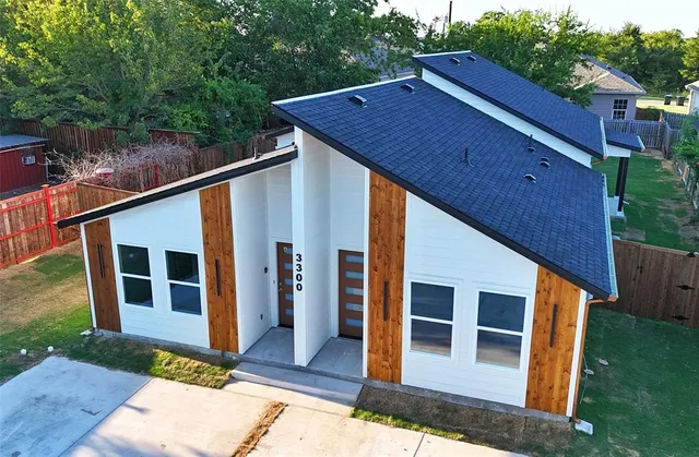 a backyard of a house with seating space