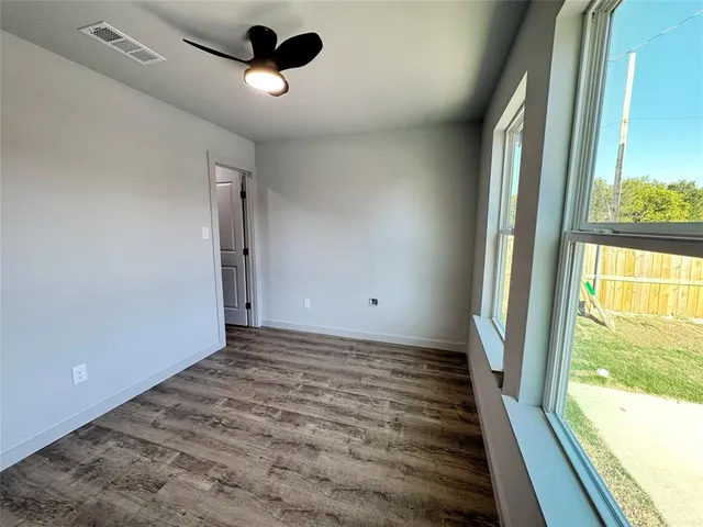 a view of a room with a that has a window