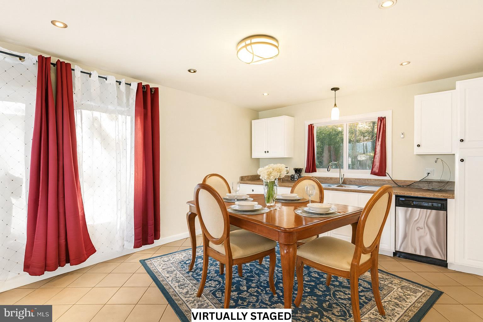 310 Brush Neck Road Susan, VA 23163 - Photo 11 of 66 a view of a dining room with furniture and a window