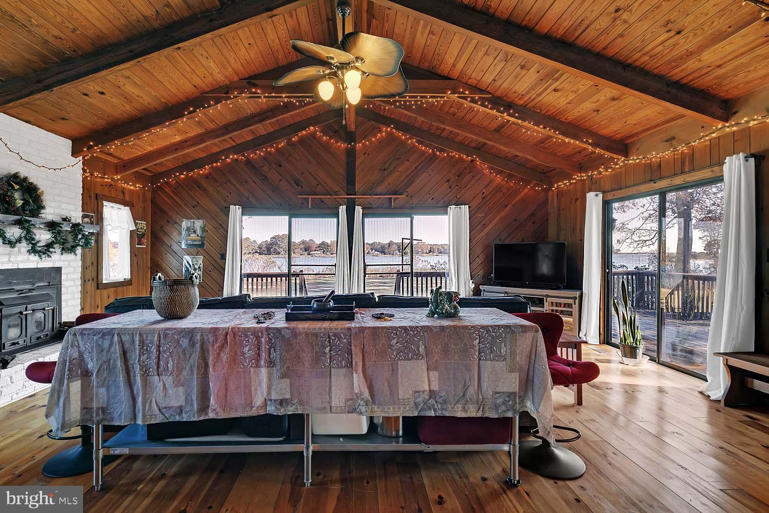 310 Brush Neck Road Susan, VA 23163 - Photo 16 of 66 a bedroom with furniture and large windows