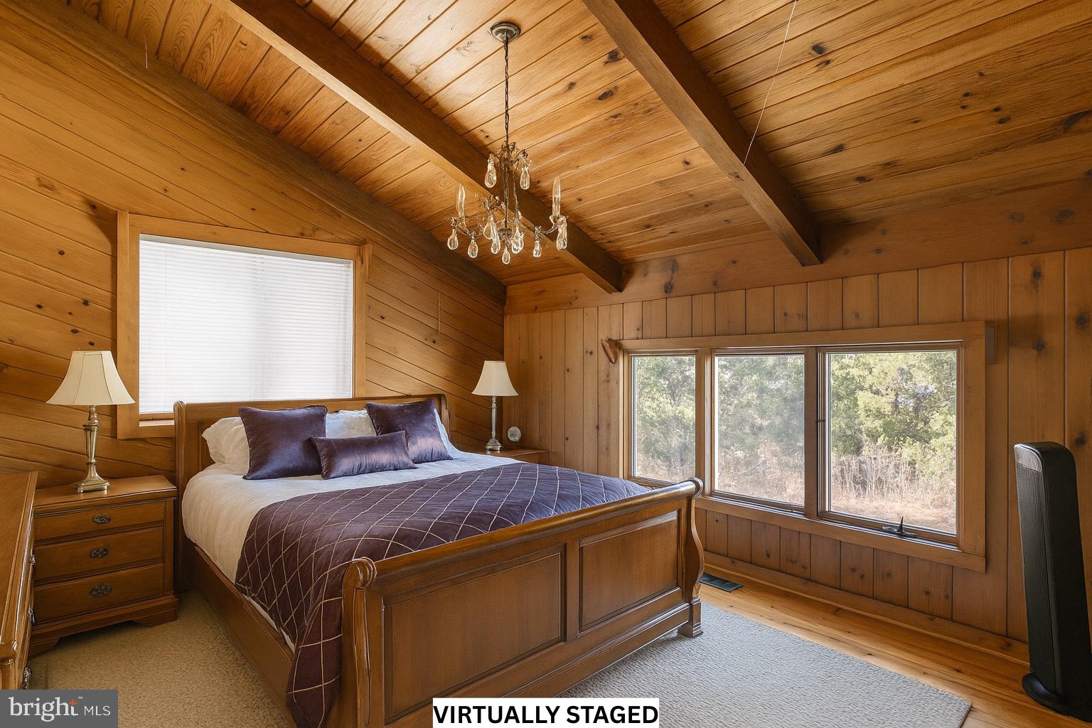 310 Brush Neck Road Susan, VA 23163 - Photo 17 of 66 a bed sitting in a bedroom next to a window
