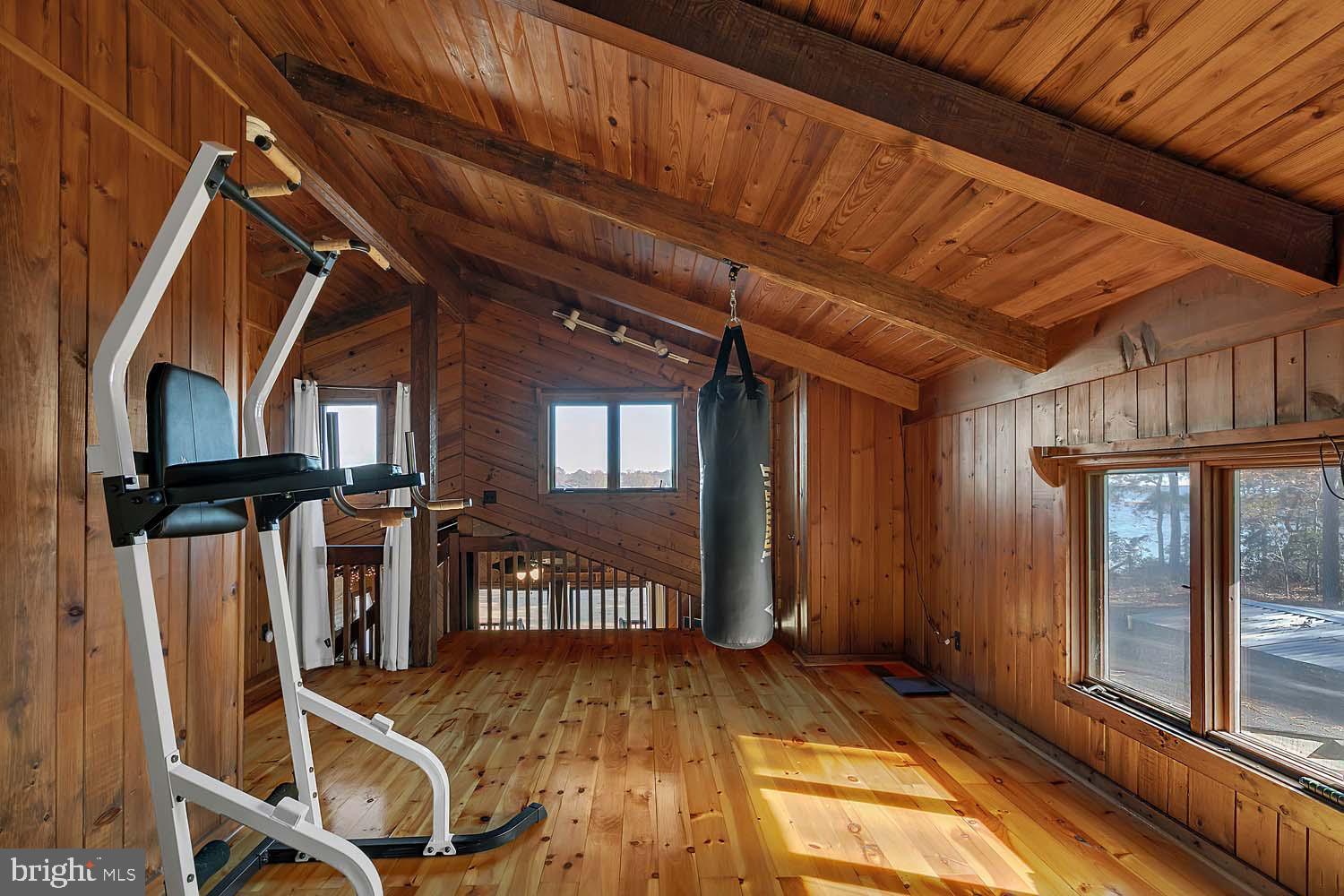310 Brush Neck Road Susan, VA 23163 - Photo 20 of 66 a view of balcony with wooden floor and iron stairs