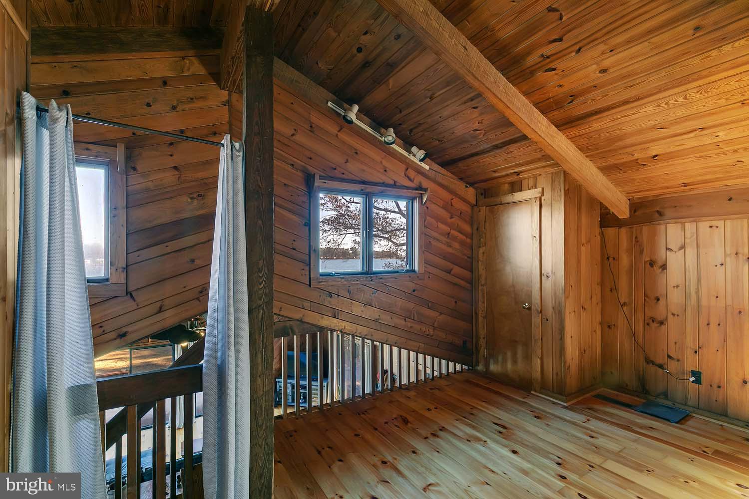 310 Brush Neck Road Susan, VA 23163 - Photo 23 of 66 a view of a porch with wooden floor and stairs