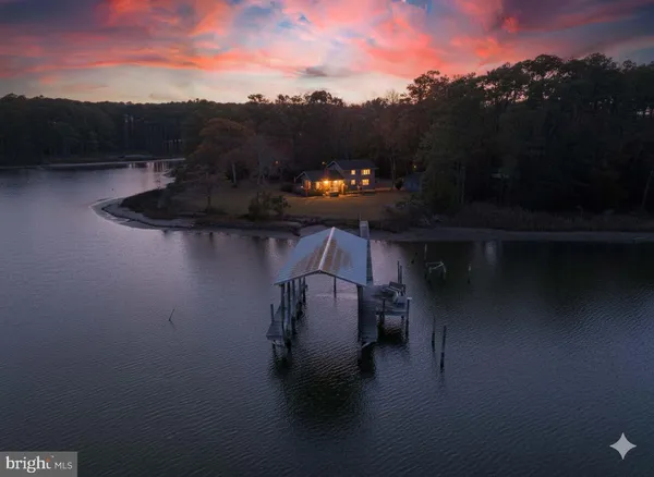 a view of a balcony with chair and table