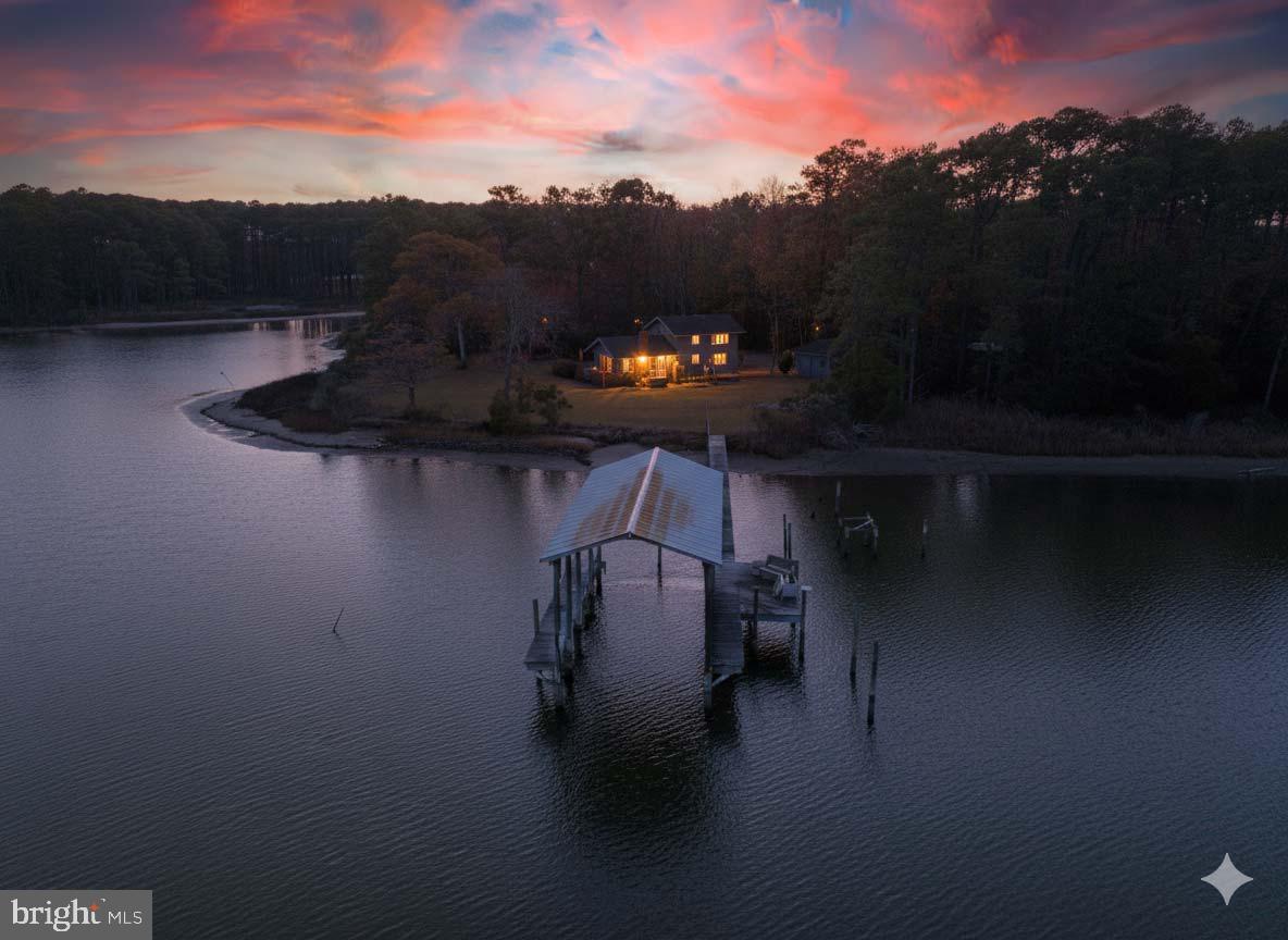 310 Brush Neck Road Susan, VA 23163 - Photo 4 of 66 a view of a balcony with chair and table