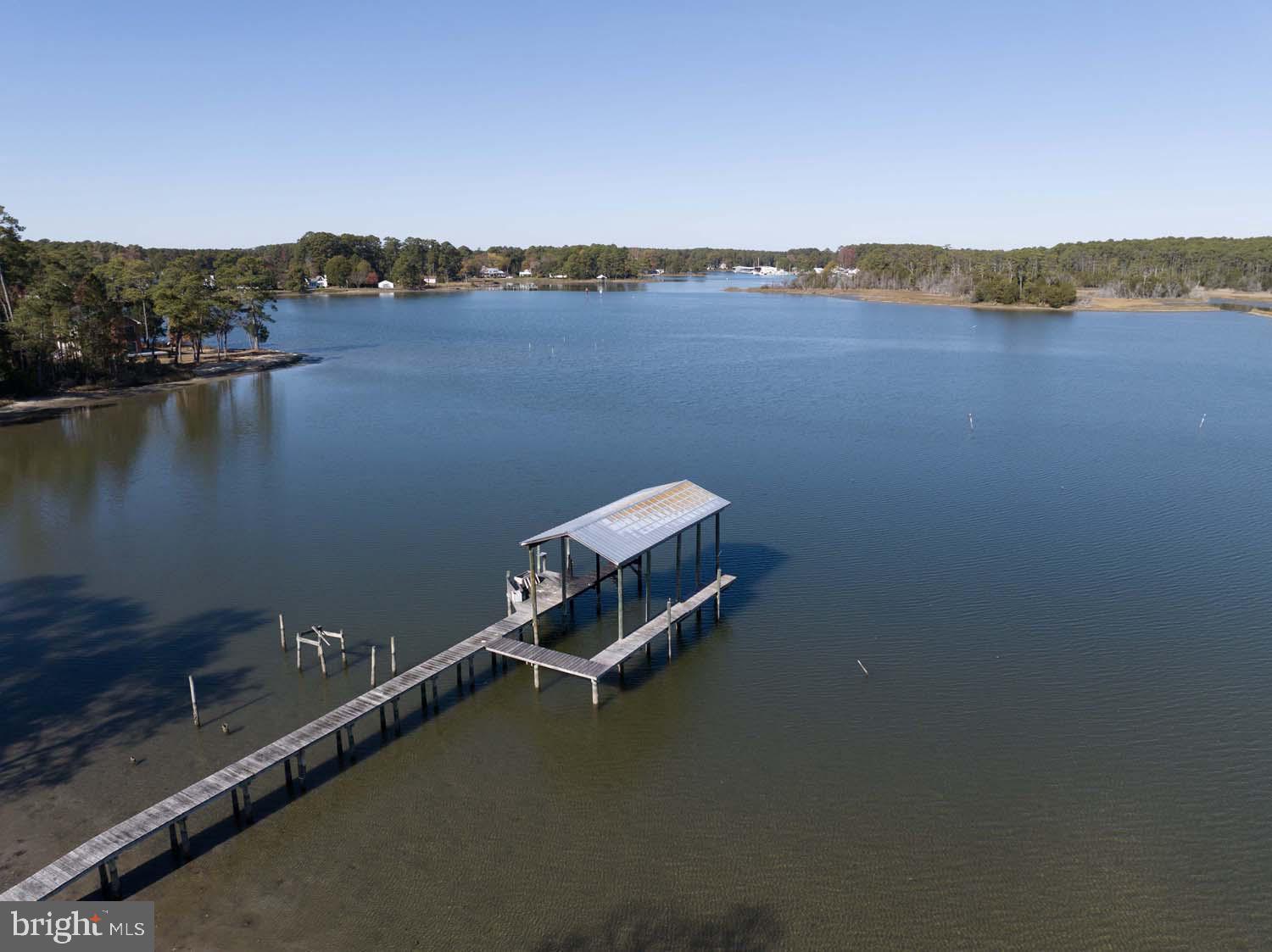 310 Brush Neck Road Susan, VA 23163 - Photo 49 of 66 a view of a lake with a mountain