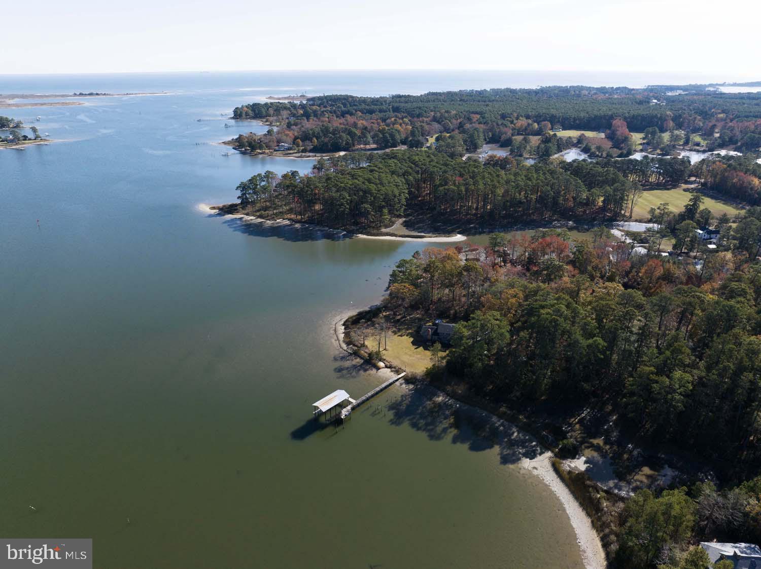 310 Brush Neck Road Susan, VA 23163 - Photo 54 of 66 an aerial view of a house with a lake view