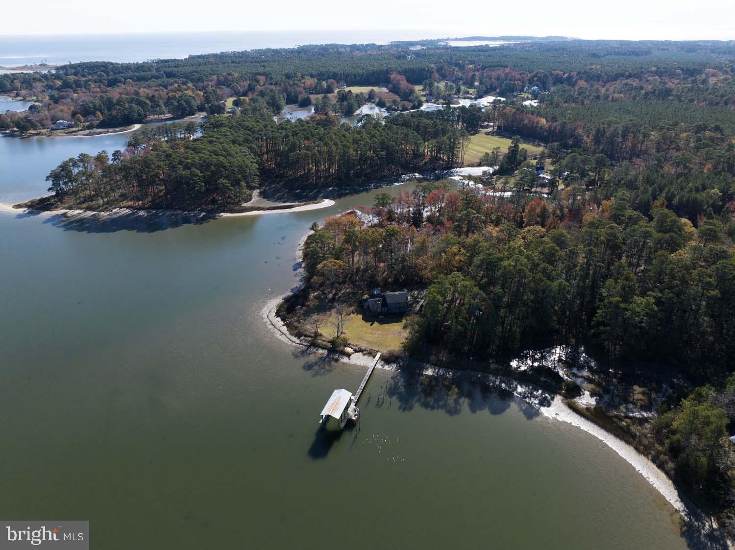 310 Brush Neck Road Susan, VA 23163 - Photo 58 of 66 an aerial view of a house with a lake view