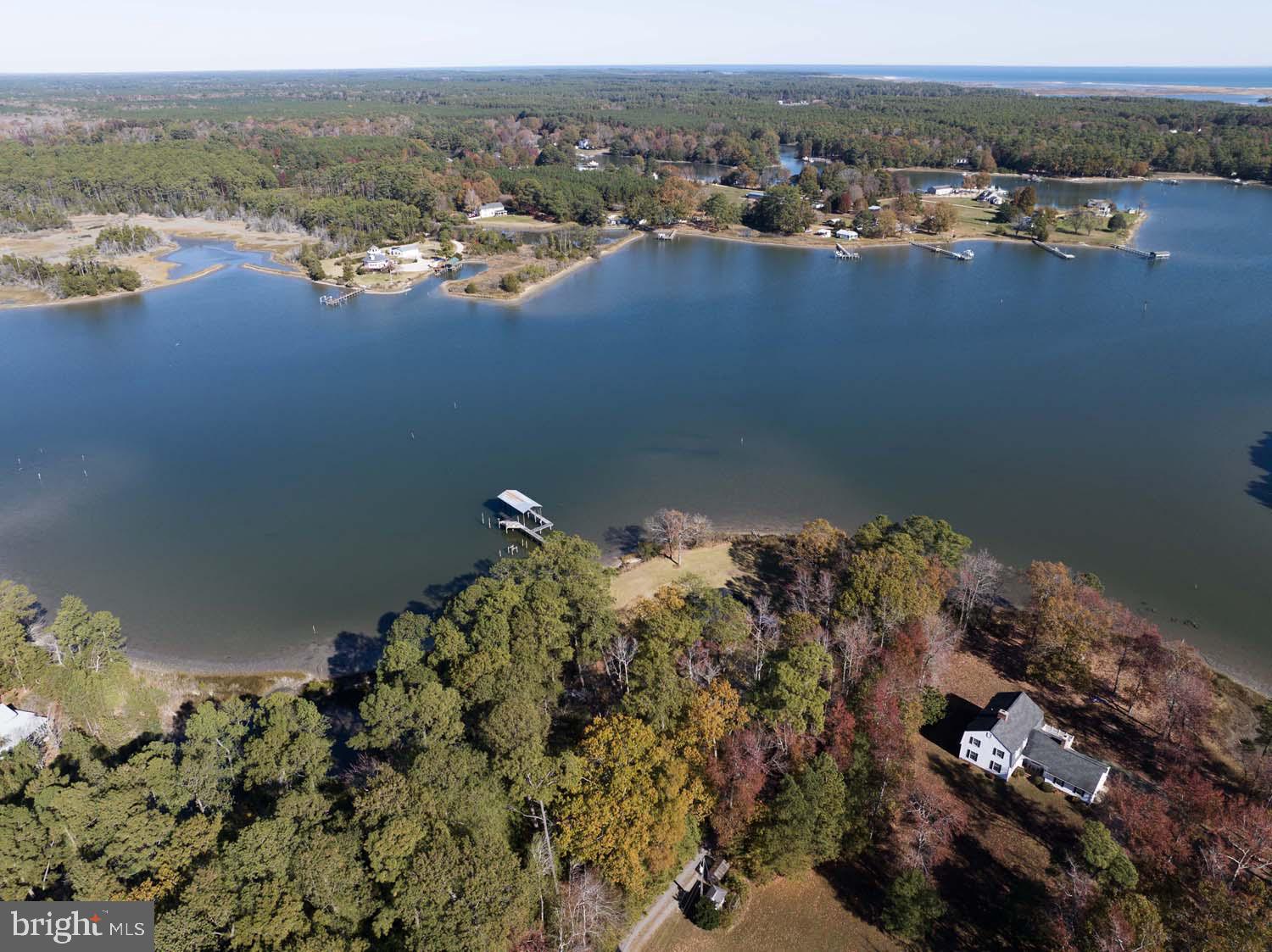 310 Brush Neck Road Susan, VA 23163 - Photo 60 of 66 an aerial view of a houses with a lake