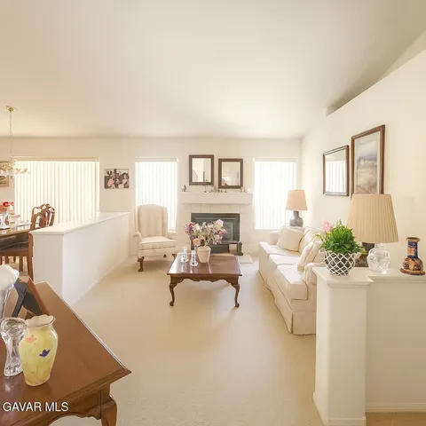 a living room with furniture and a couch