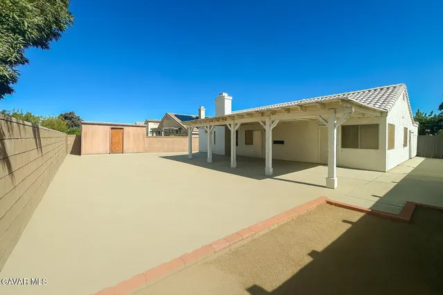 a house view with a outdoor space