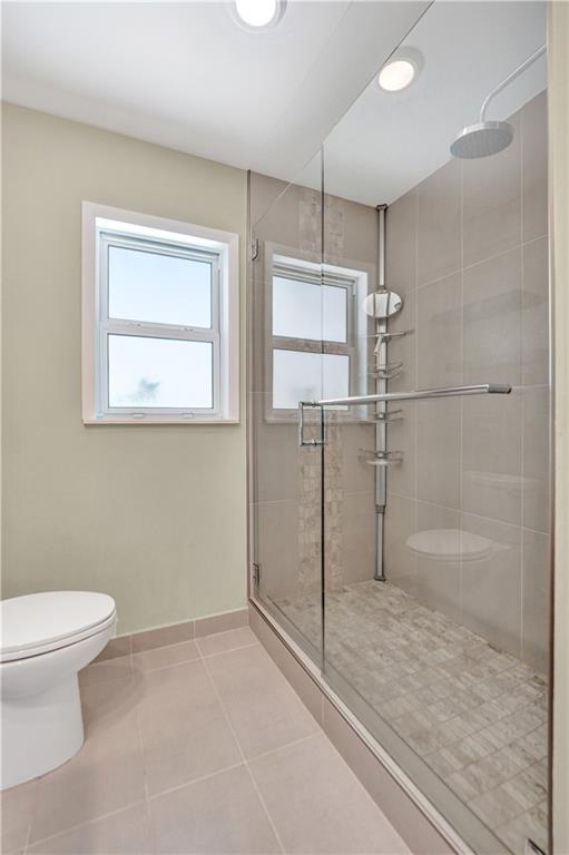 5760 Southwest 7th Street Plantation, FL 33317 - Photo 40 of 56 a bathroom with a shower and a toilet