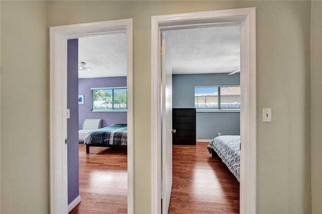 5760 Southwest 7th Street Plantation, FL 33317 - Photo 42 of 56 a view of a bedroom from a hallway