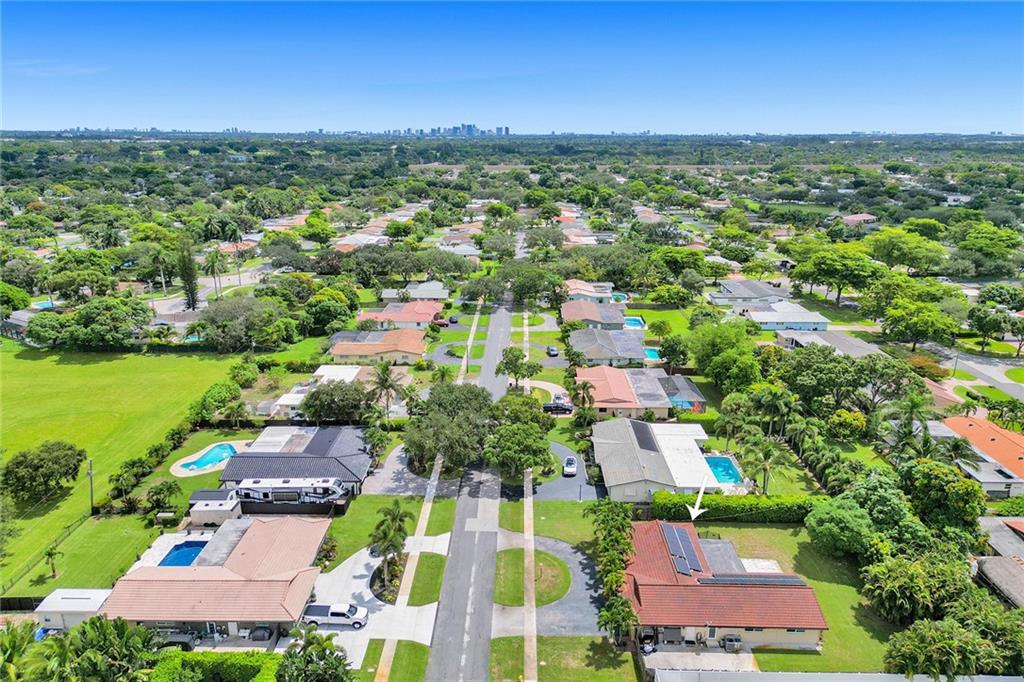 5760 Southwest 7th Street Plantation, FL 33317 - Photo 10 of 56 an aerial view of residential houses with outdoor space and ocean view