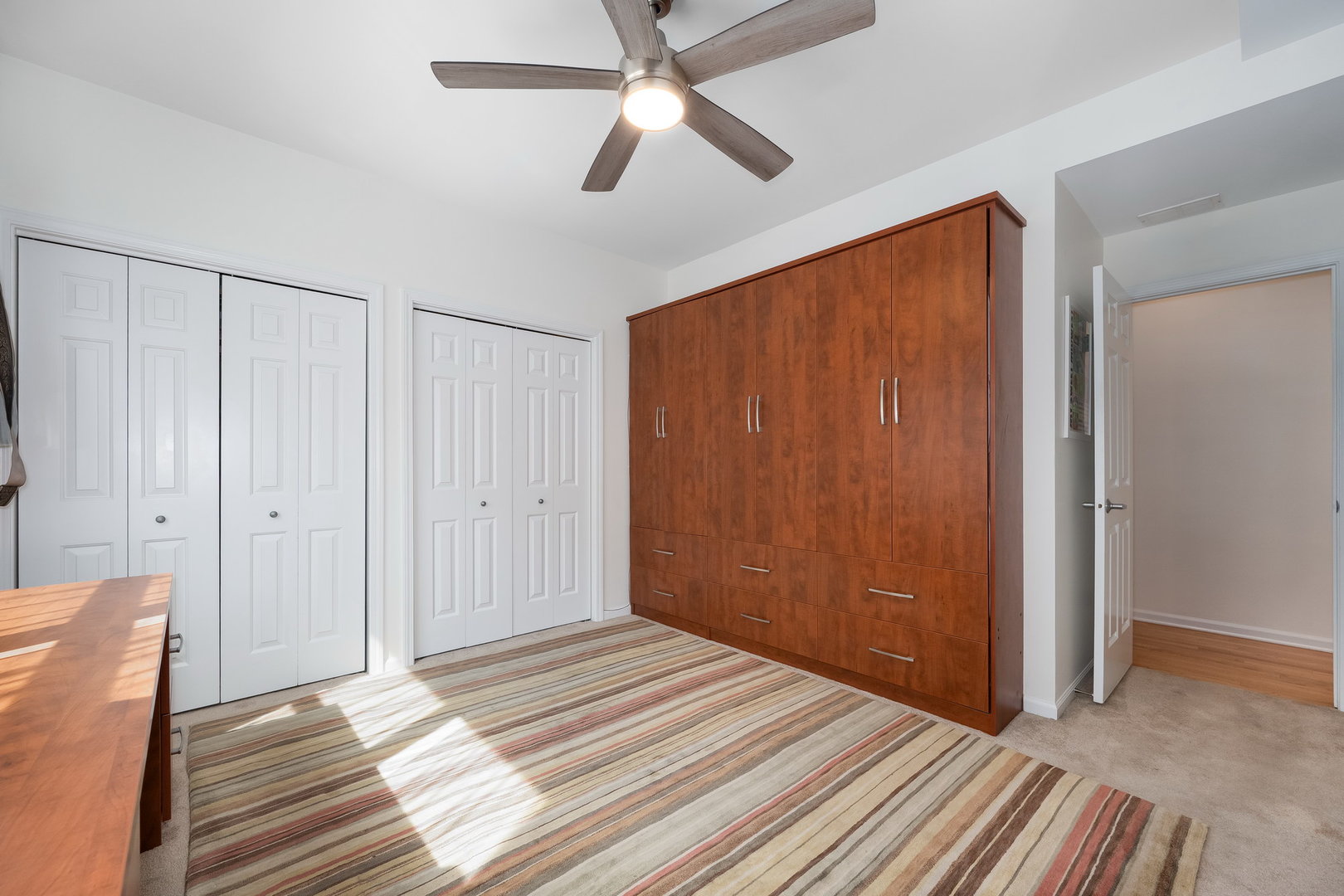 4826 North Winthrop Avenue, Unit 2S Chicago, IL 60640 - Photo 16 of 21 a view of a bedroom with wooden floor
