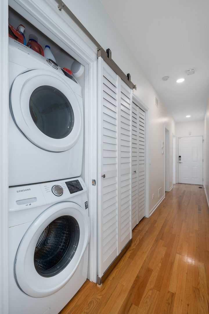 4826 North Winthrop Avenue, Unit 2S Chicago, IL 60640 - Photo 17 of 21 a view of a storage & utility room with washer and dryer