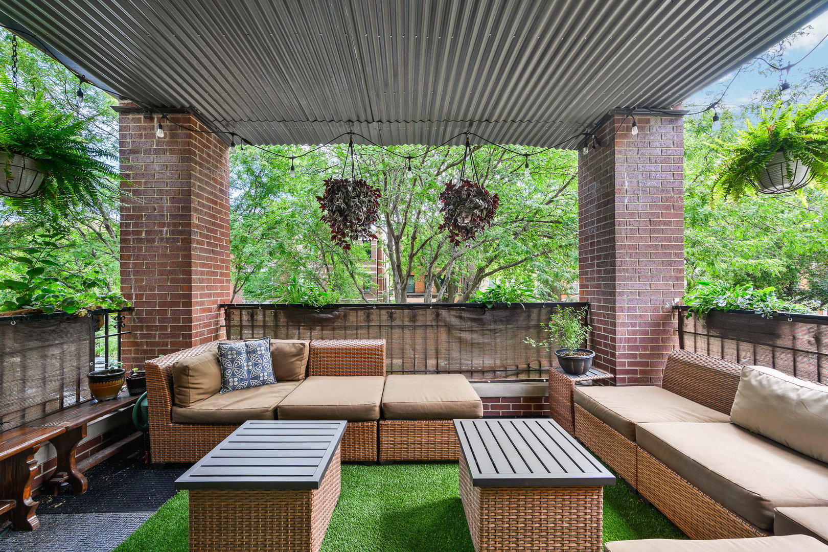 4826 North Winthrop Avenue, Unit 2S Chicago, IL 60640 - Photo 18 of 21 a view of a patio with couches chairs and wooden floor