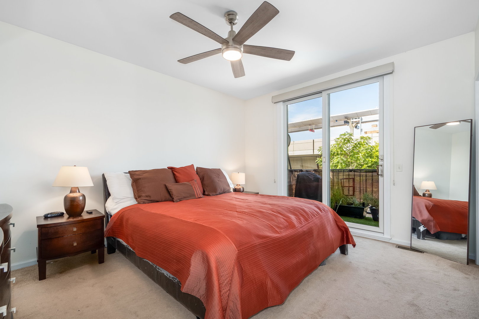 4826 North Winthrop Avenue, Unit 2S Chicago, IL 60640 - Photo 10 of 21 a bedroom with a bed and a large window