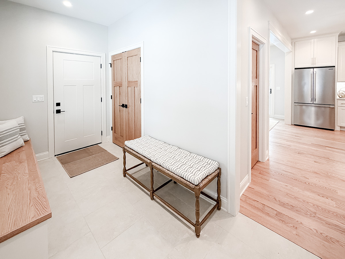 885 Geneva Road St. Charles, IL 60174 - Photo 31 of 62 a spacious bedroom with a bed and a chandelier