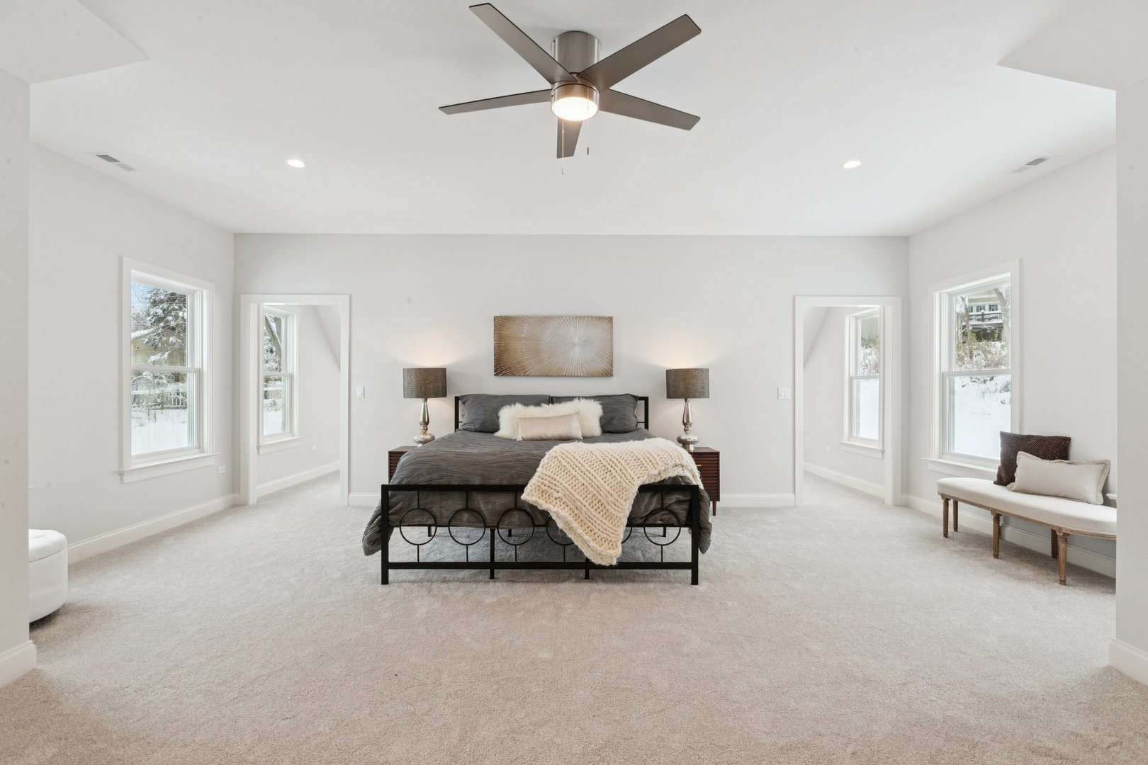 885 Geneva Road St. Charles, IL 60174 - Photo 36 of 62 a spacious bedroom with a bed and ceiling fan