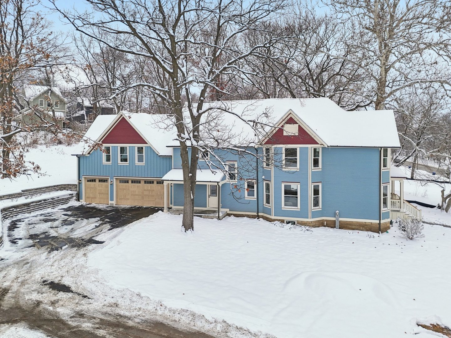 885 Geneva Road St. Charles, IL 60174 - Photo 53 of 62 a front view of a house with a yard covered with snow in front of house