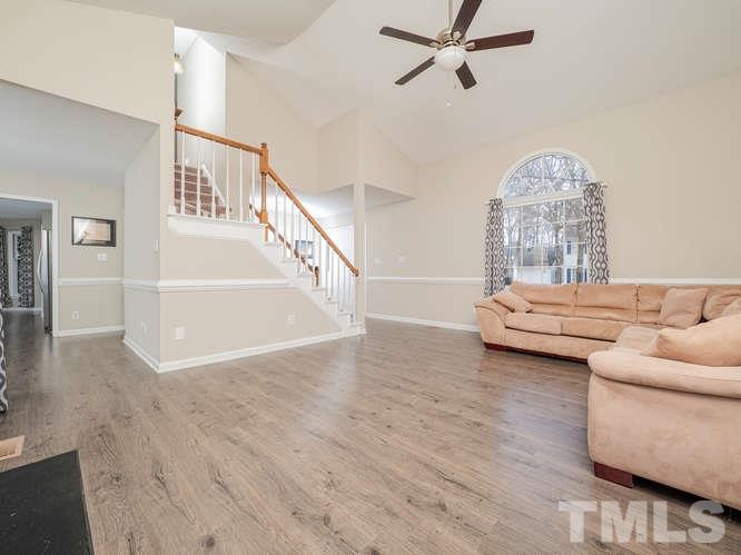 5520 Edgebury Road Raleigh, NC 27613 - Photo 2 of 29 a view of livingroom with furniture and wooden floor