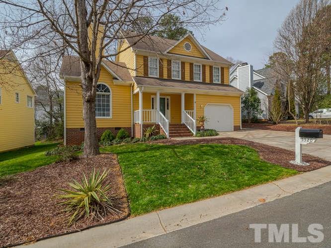 5520 Edgebury Road Raleigh, NC 27613 - Photo 28 of 29 a front view of a house with garden