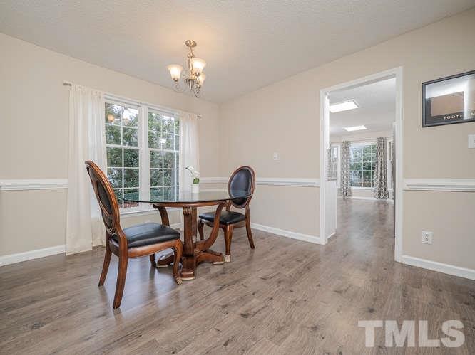 5520 Edgebury Road Raleigh, NC 27613 - Photo 10 of 29 a dining room with furniture and window