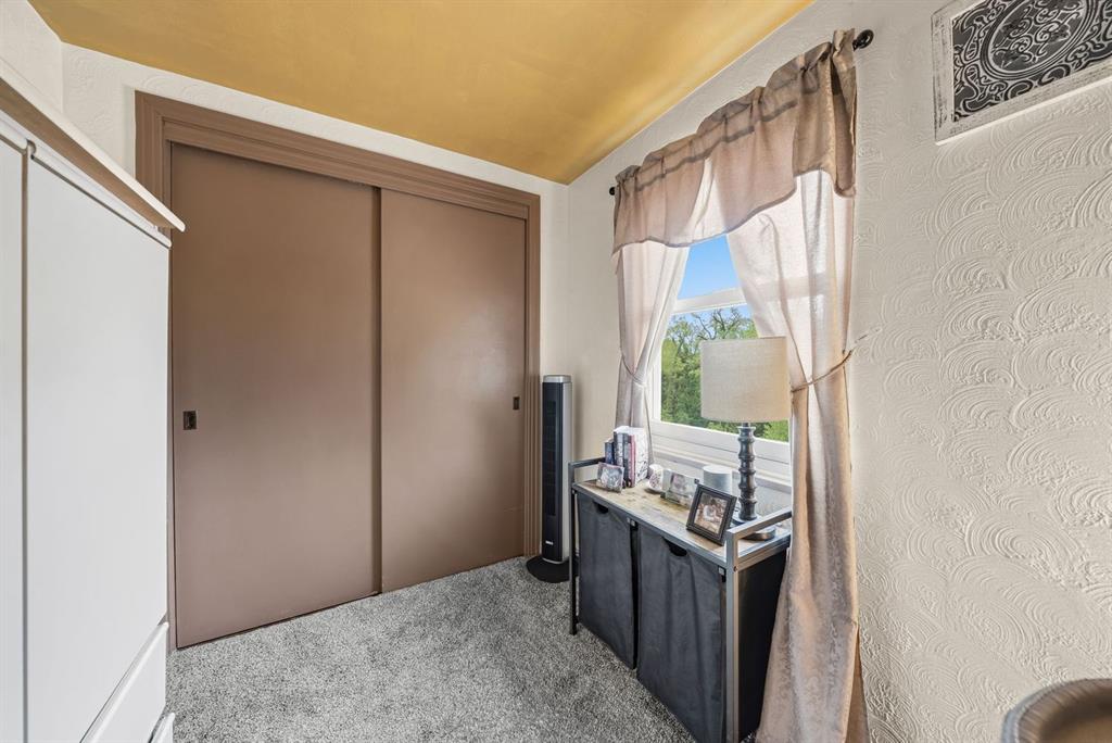 4768 Rolling Hills Road Pittsburgh, PA 15236 - Photo 25 of 46 a bed room with a bed and a window