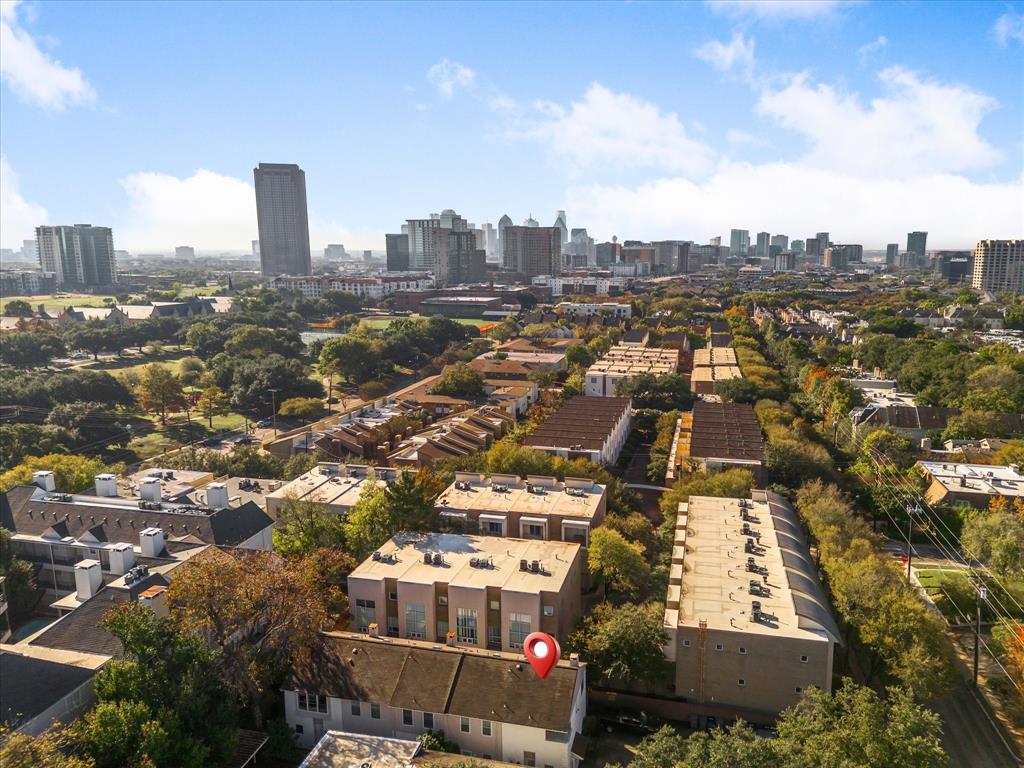 4110 Travis Street, Unit E Dallas, TX 75204 - Photo 5 of 23 an aerial view of a city with lots of residential buildings