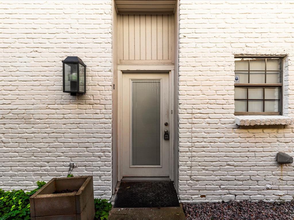 4110 Travis Street, Unit E Dallas, TX 75204 - Photo 7 of 23 a view of front door of house