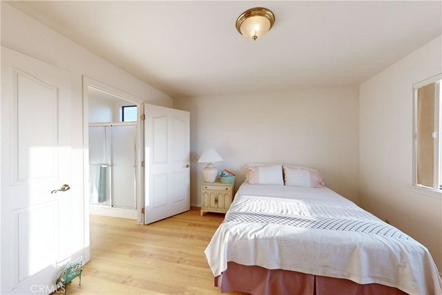 an aerial view of a house with a lake view