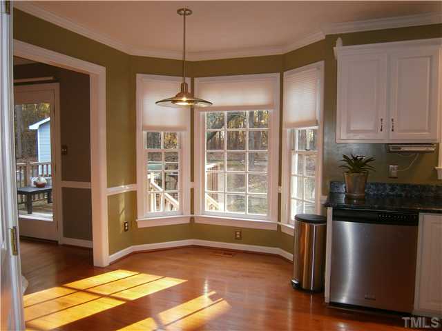 2124 Virginia Dare Place Raleigh, NC 27610 - Photo 7 of 25 Beautiful Bay Window for viewing pleasures of serene backyard.
