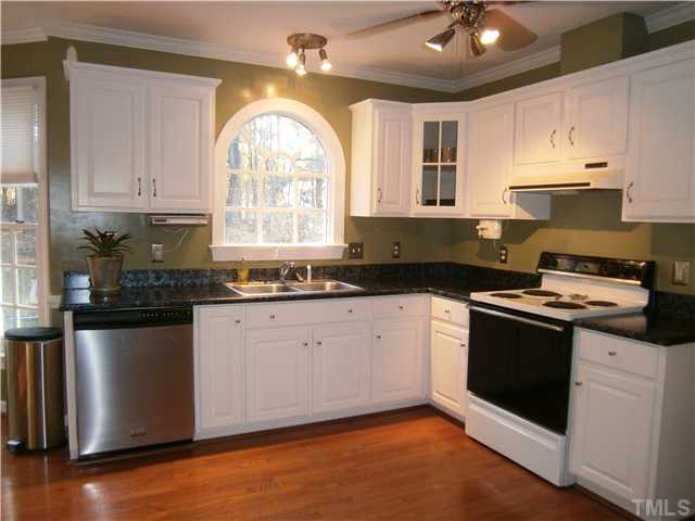 2124 Virginia Dare Place Raleigh, NC 27610 - Photo 8 of 25 All appliances convey. Paladium window allows natural lighting. Dishwasher 2011 model.