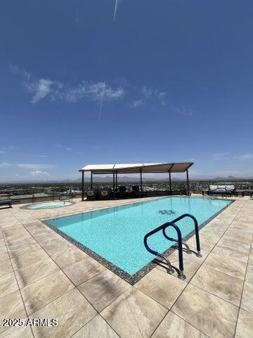7181 East Camelback Road, Unit 201 Scottsdale, AZ 85251 - Photo 15 of 15 a view of swimming pool with seating space