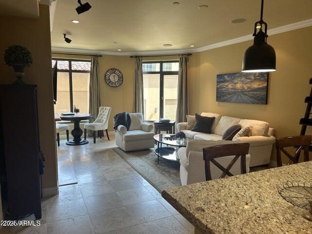 7181 East Camelback Road, Unit 201 Scottsdale, AZ 85251 - Photo 2 of 15 a living room with furniture and a large window