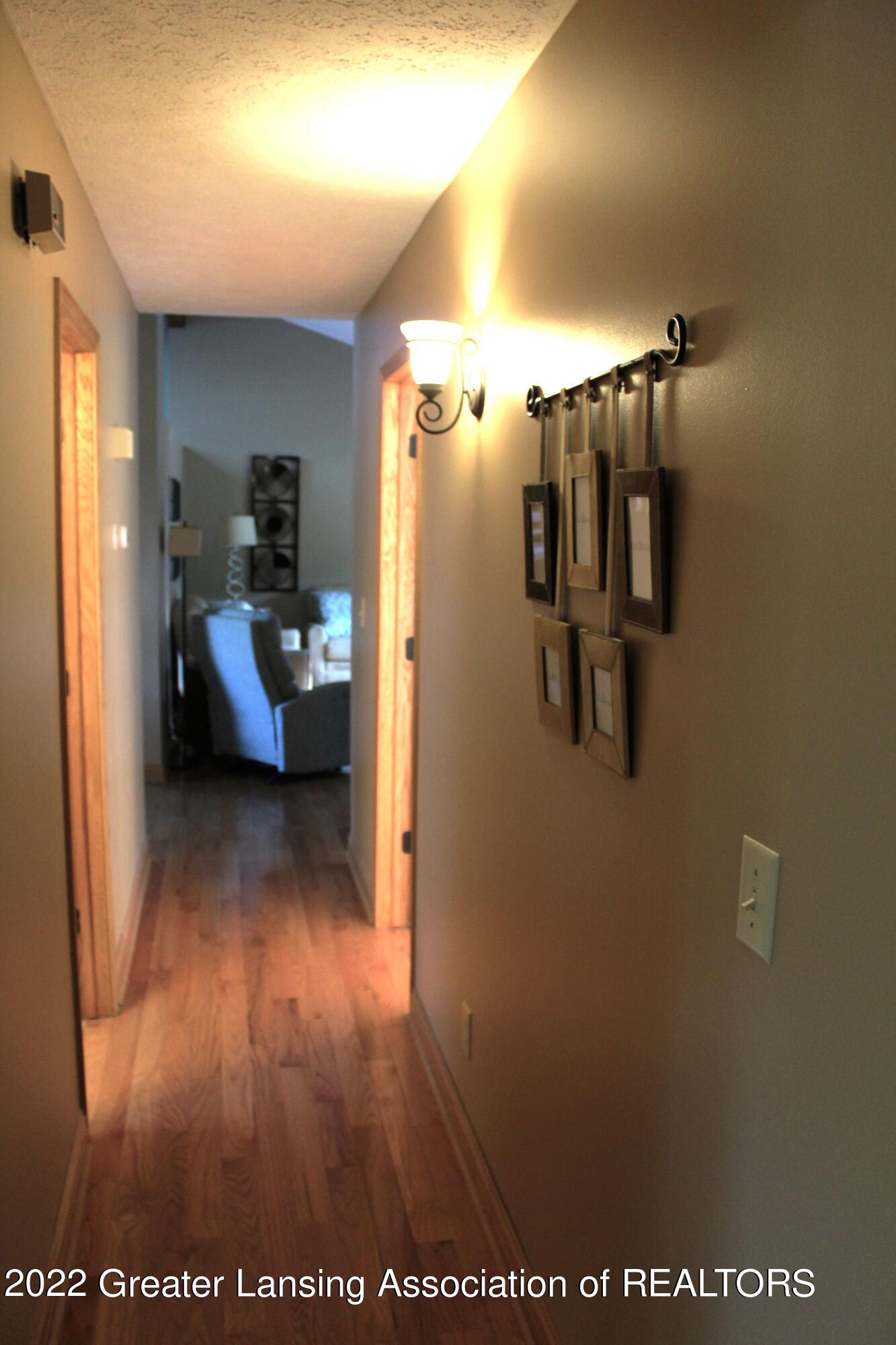 4254 Hulett Road Okemos, MI 48864 - Photo 23 of 43 hallway to bedrooms