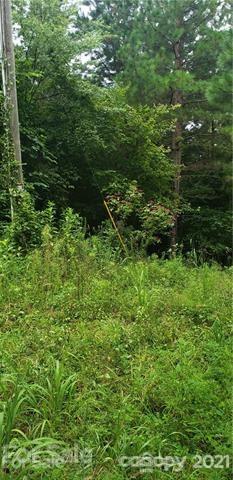 4580 Barrier Road Concord, NC 28025 - Photo 3 of 6 a view of a lush green forest with lots of trees