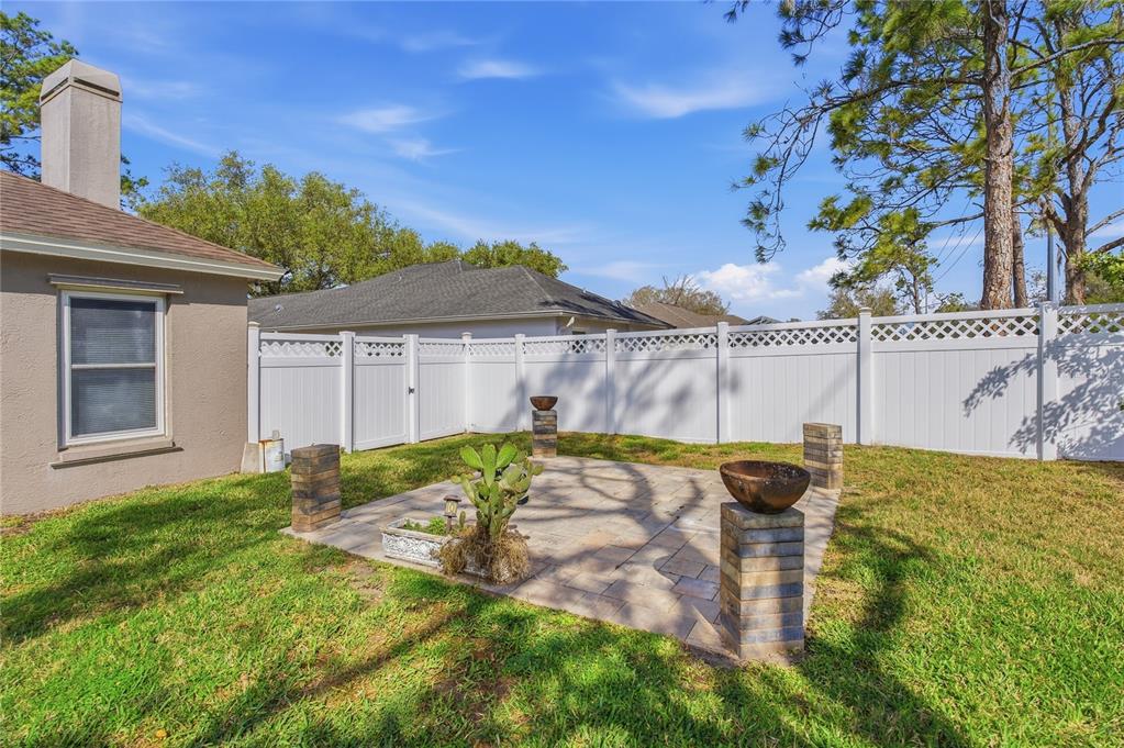 17431 Isbell Lane Odessa, FL 33556 - Photo 44 of 47 a view of an house with backyard space and balcony