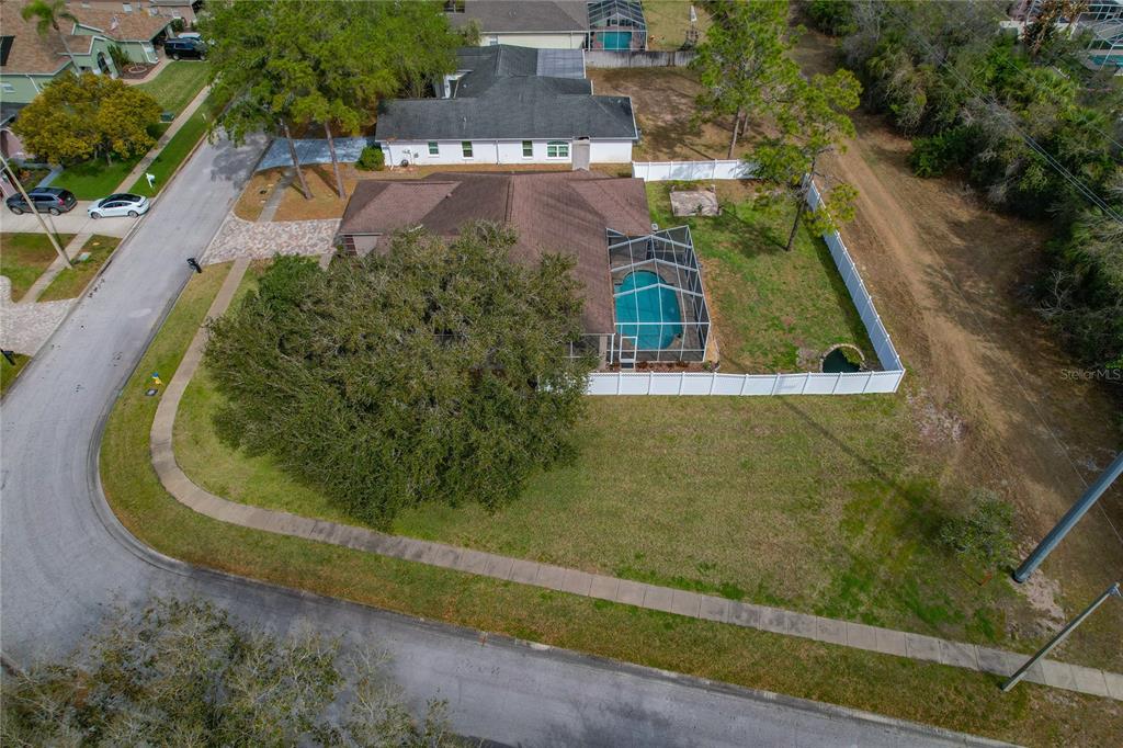 17431 Isbell Lane Odessa, FL 33556 - Photo 46 of 47 an aerial view of a house with a yard