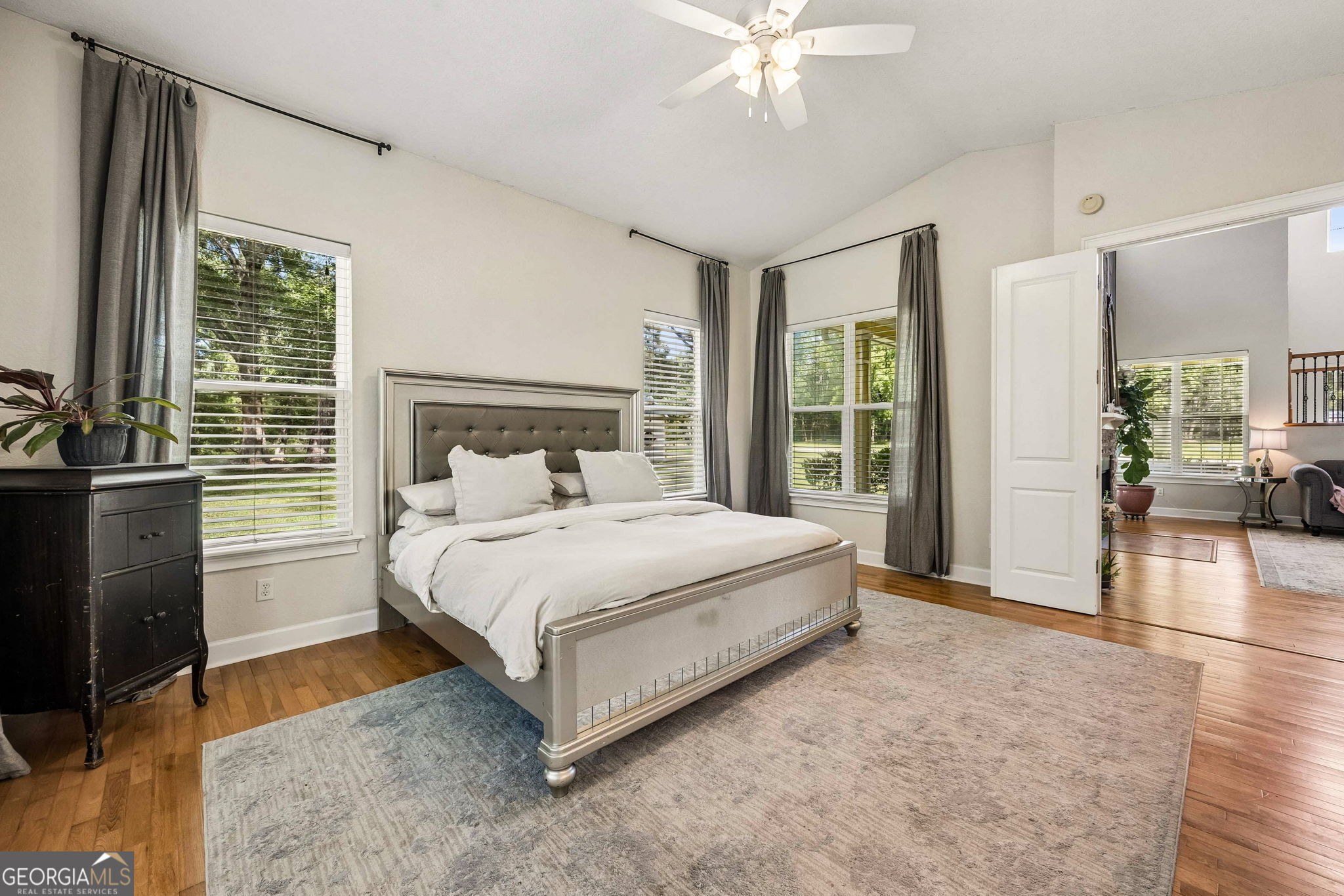 706 Hopewell Point Road White Oak, GA 31568 - Photo 32 of 84 Large windows, soaring ceilings, and generous floor space make this owner's retreat both comfortable and inviting.