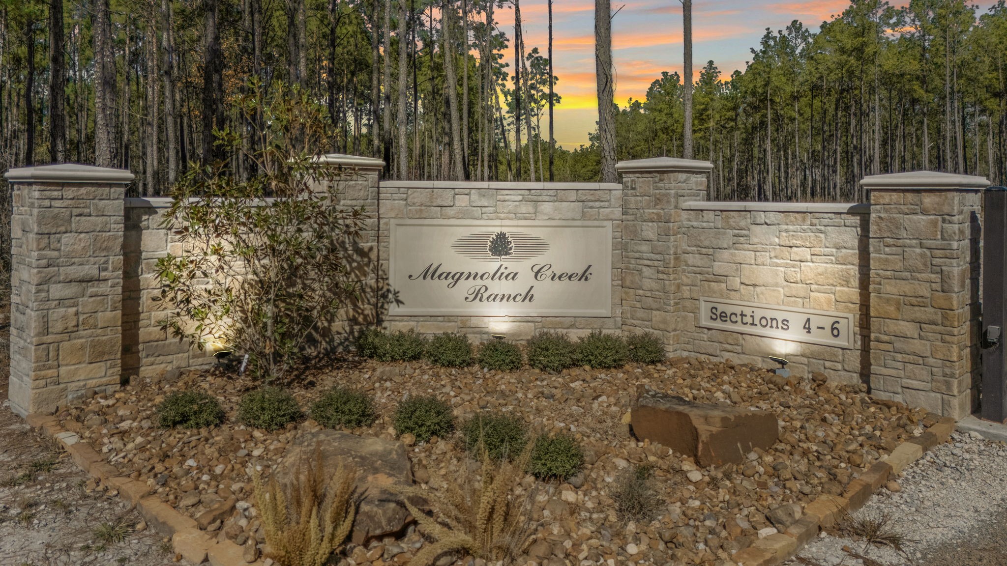 314 Sportsman Retreat Road Onalaska, TX 77360 - Photo 17 of 17 a view of a sign board with tall buildings
